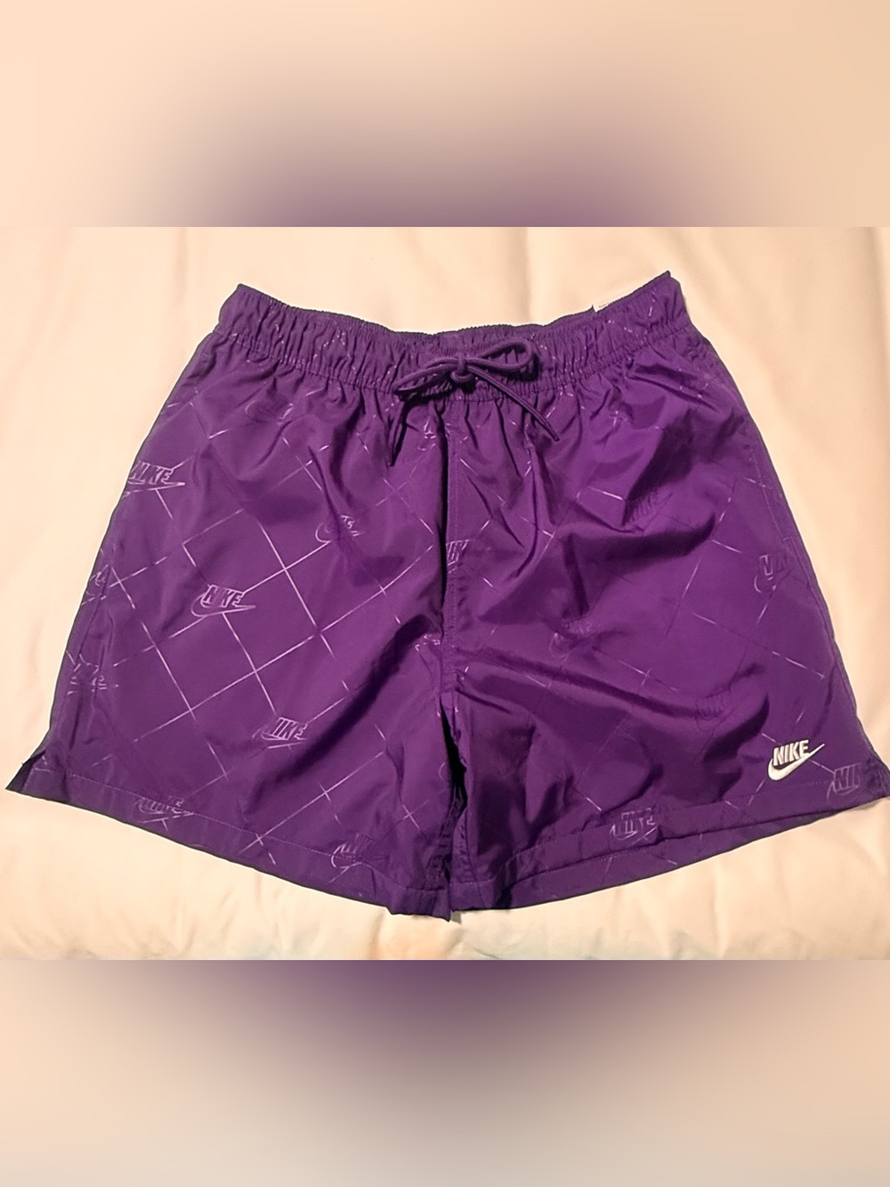 Nike Men's Purple Athletic Shorts with Subtle Logo Pattern